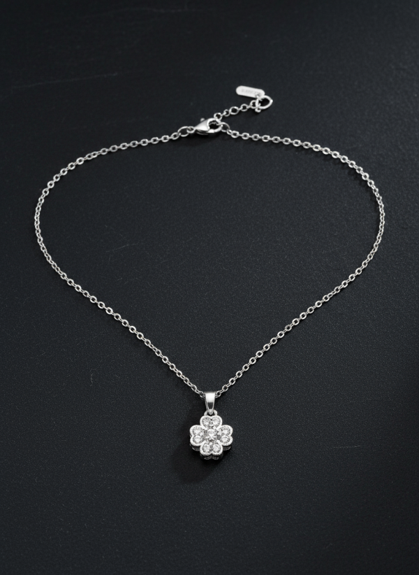 Silver-Toned Clover Pendant Necklace With a Four-Leaf Design Encrusted With Cubic Zirconia Stones